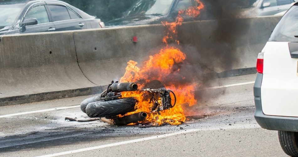 Motorcycle on fire after accident